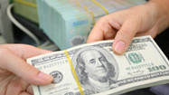 Công bố tỷ giá trung tâm giữa đồng Việt Nam và đô-la Mỹ 