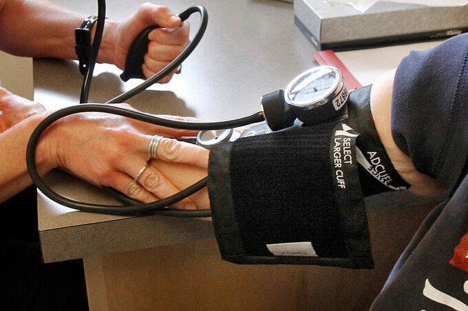 Một bệnh nhân đang được đo huyết áp ở Bang Vermont, Mỹ.